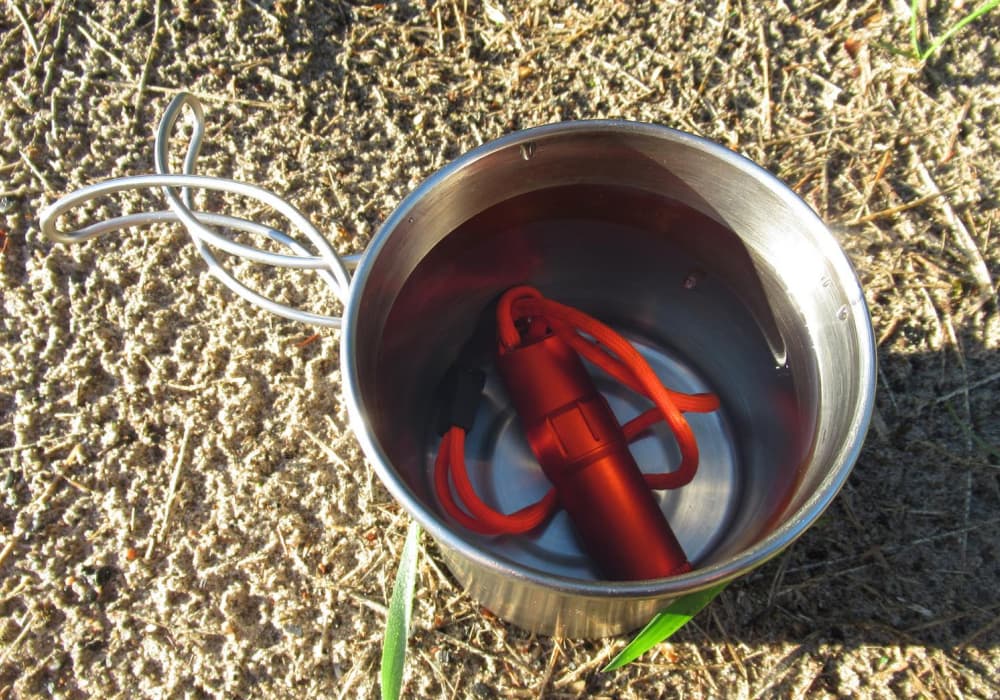 Exotac o-ring seals being tested in a bucket of water