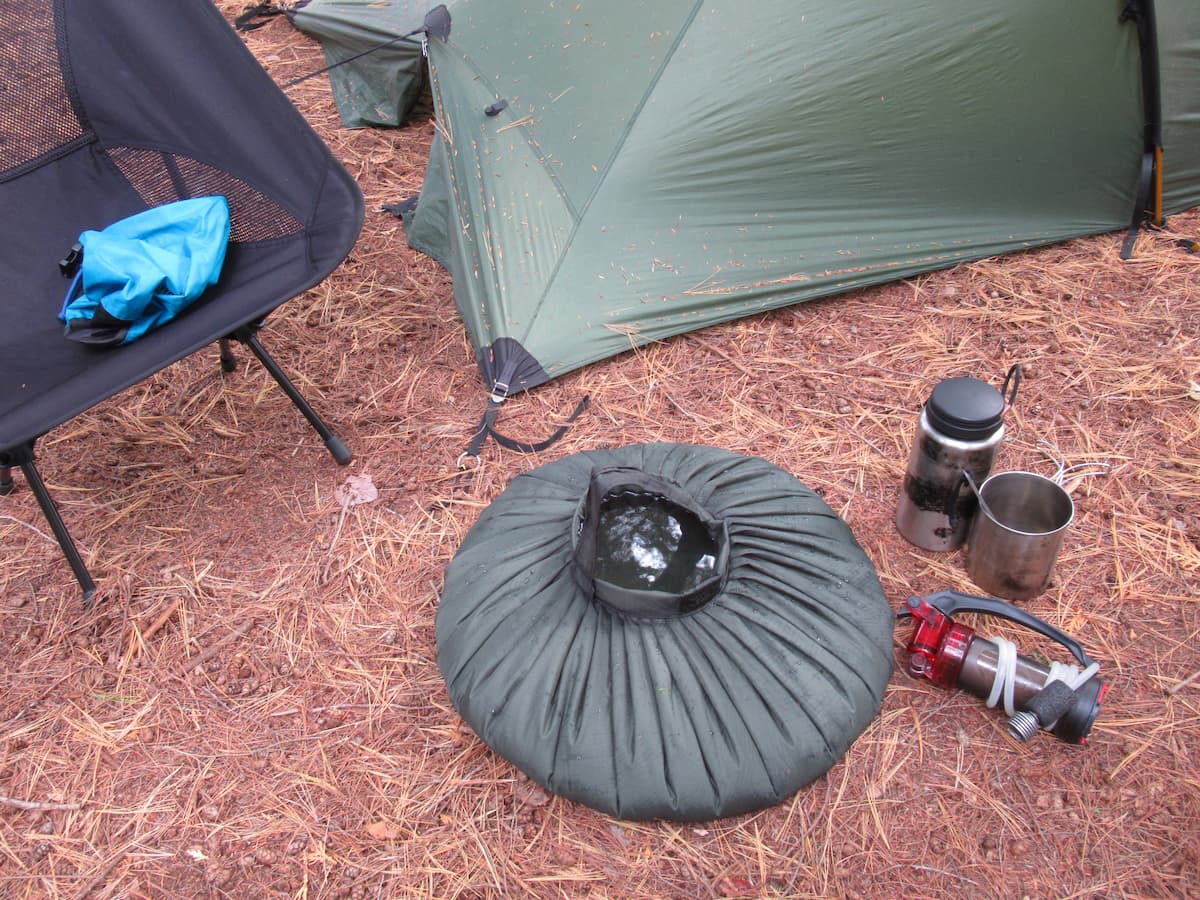 Savotta Water Carrying Bag used to fill up water bottles and cups